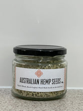 Load image into Gallery viewer, Australian Hemp Seeds packaged in a glass jar. 
